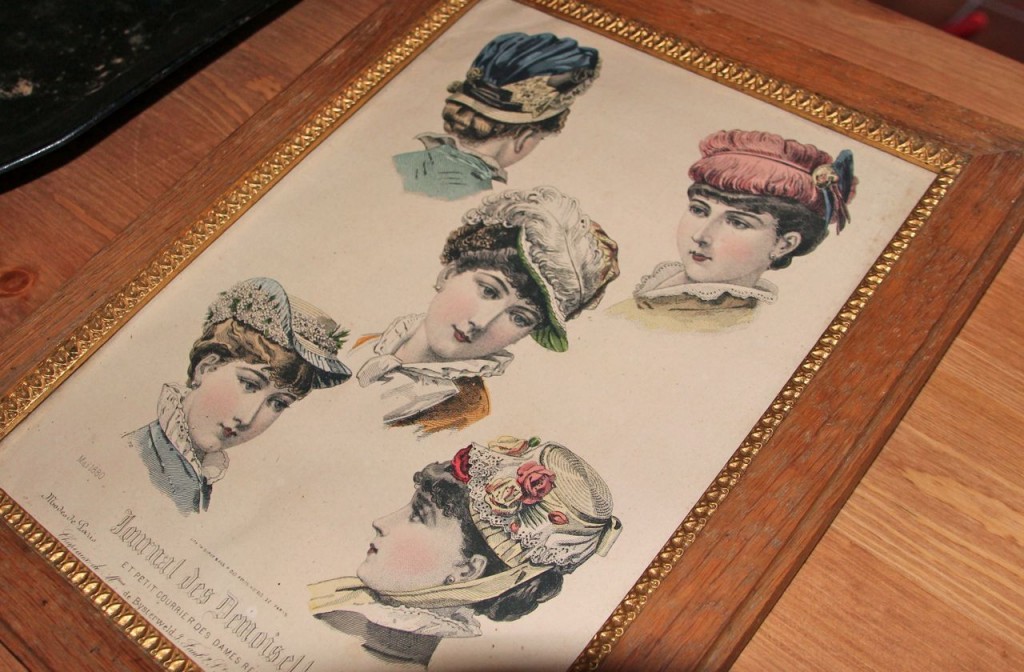 displaying hat fashions 100 years ago