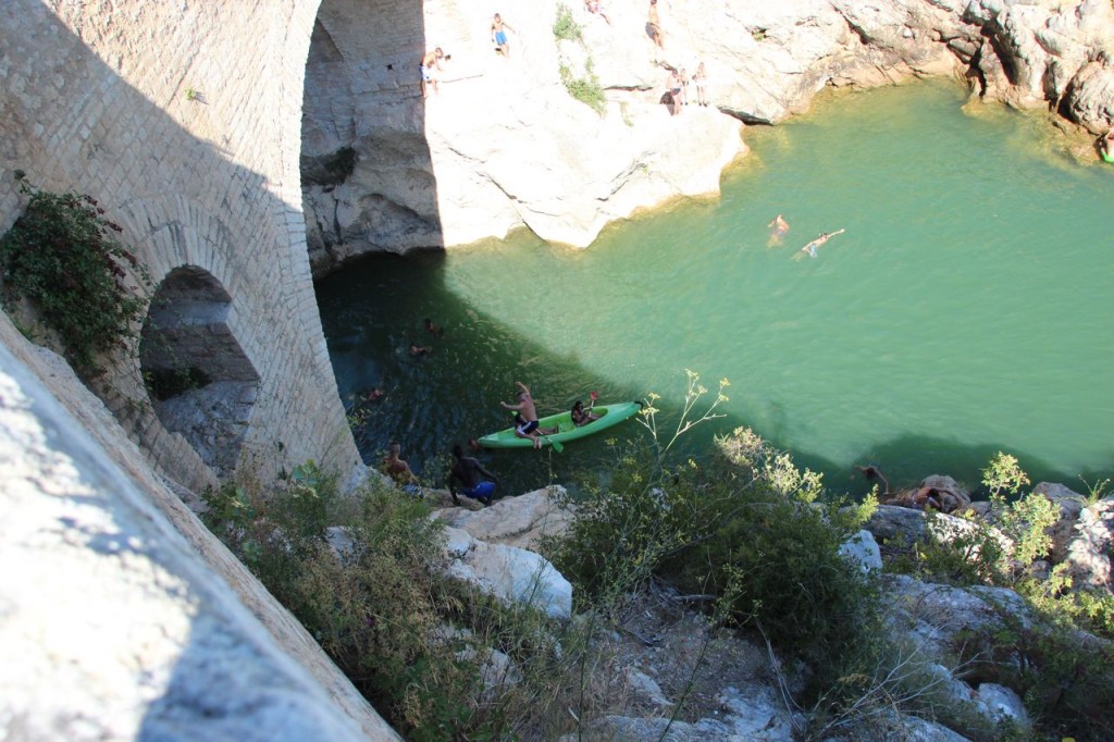 Cliff Jumpers grab canoes and soak them 