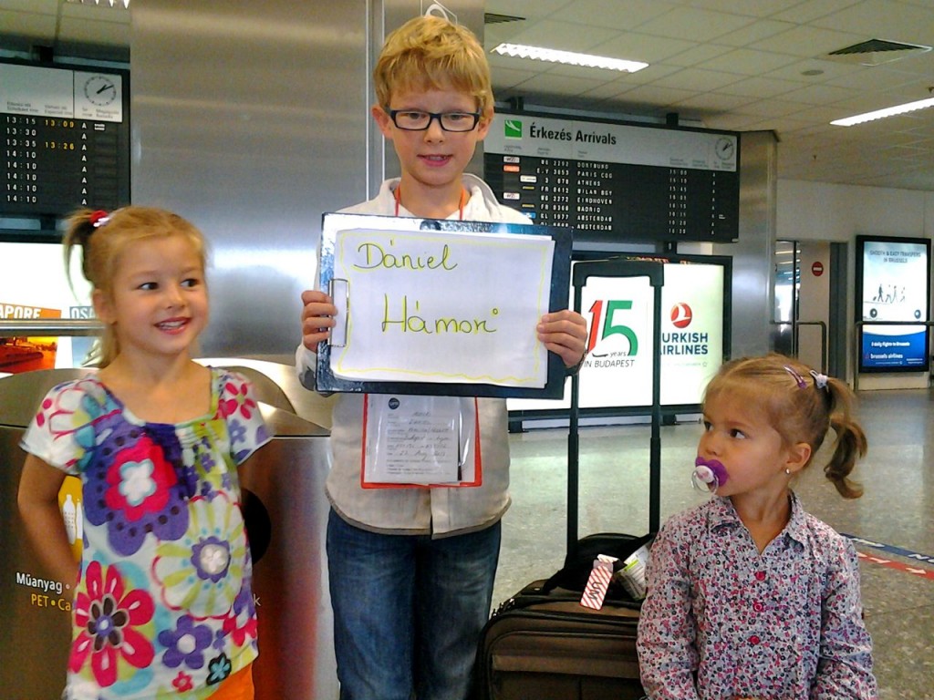 My cousins pick Daniel up at the airport 