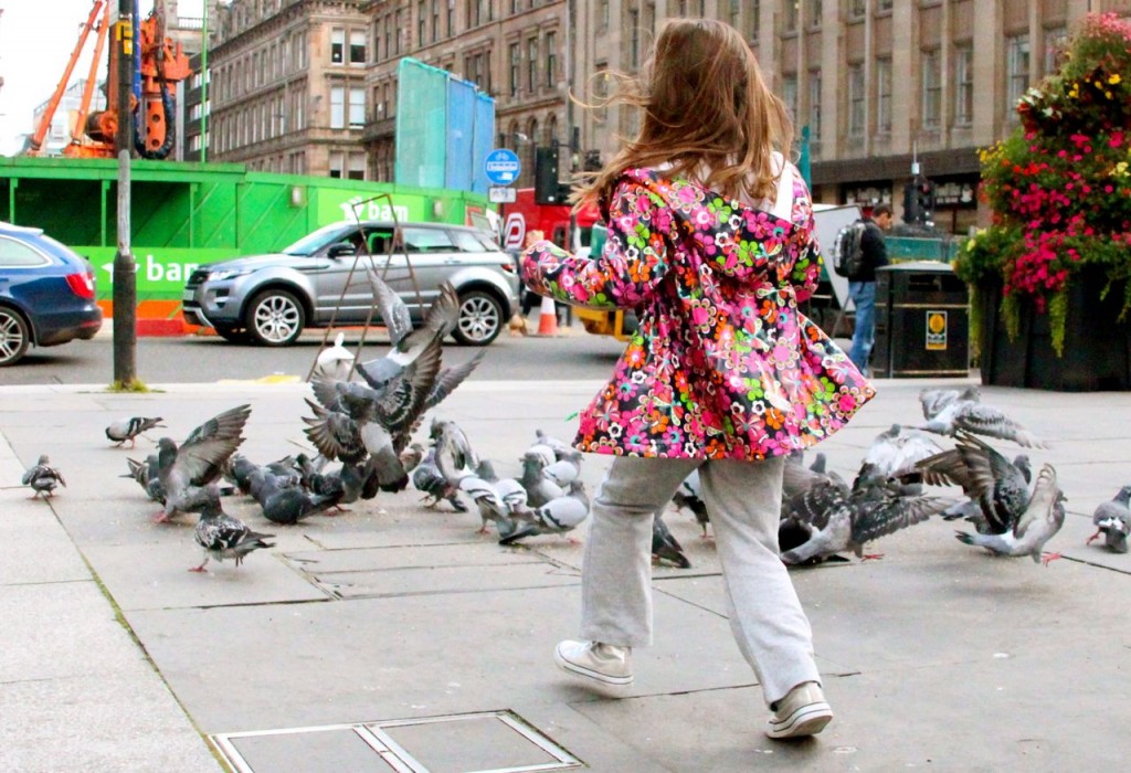 Angelina storms feeding pigeons 