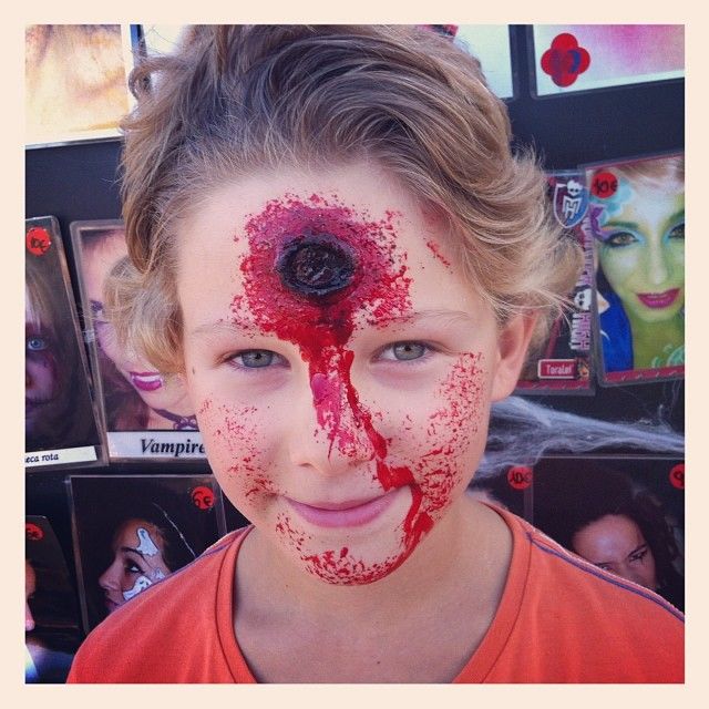 Daniel's Halloween face painting - shot in the head 